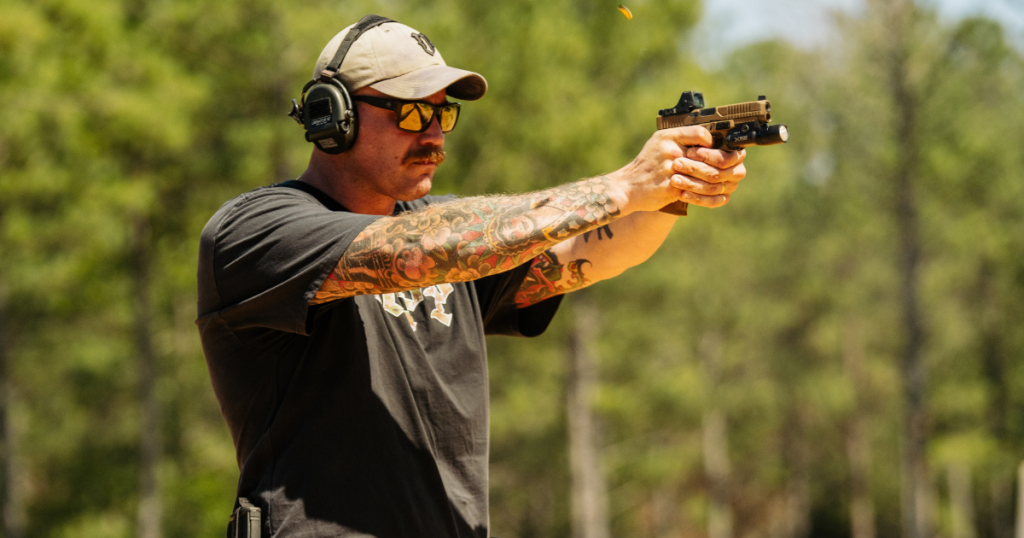 A gun owner at the range working on shooting techniques and fundamentals.