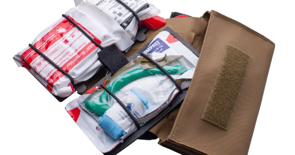Blue Alpha Medical Pouch open with its insert contents pulled out.