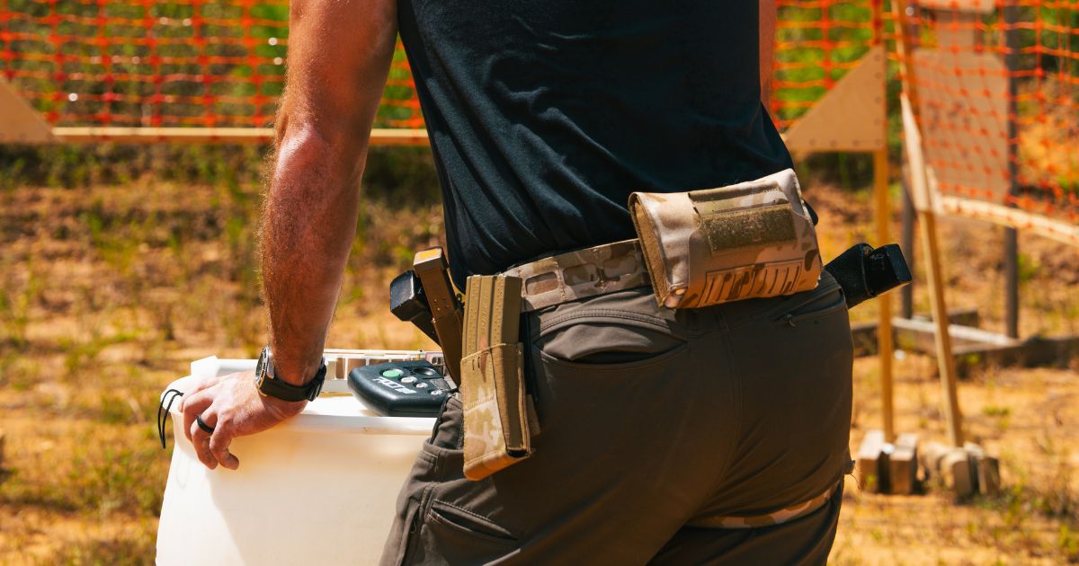 A man wearing his Blue Alpha Medical on his battle belt.